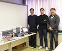 Professores Paulo Cézar Stadzisz, Elder Oroski e Marco Aurélio Wehrmeister, com os equipamentos da NI recebidos pelo LIT